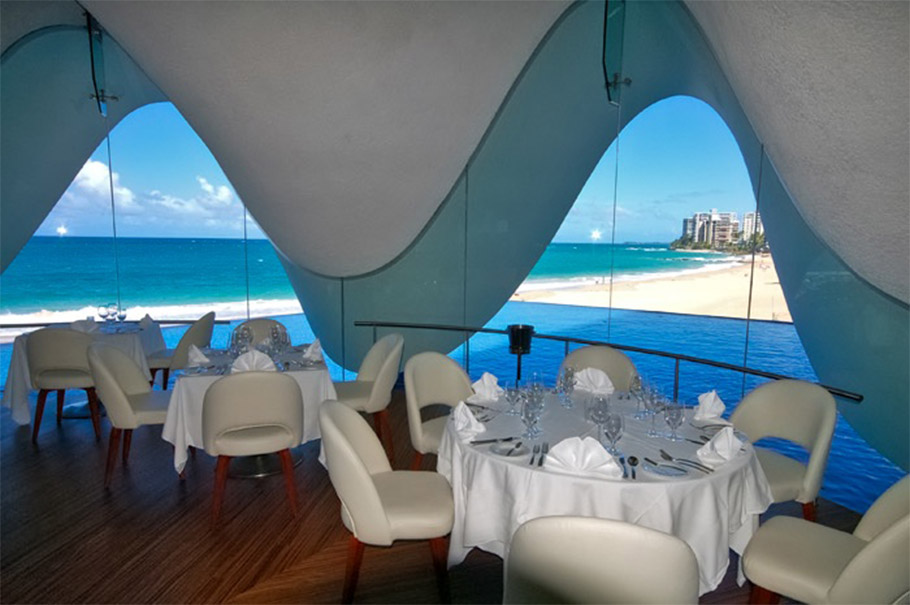 Wavy glass windows with a beach view