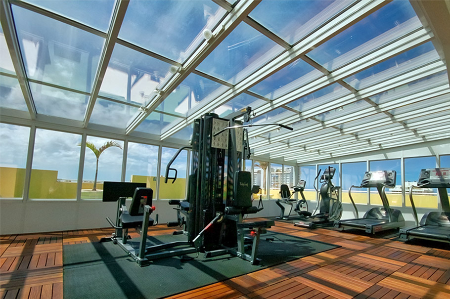 Gym with a glass roof and walls