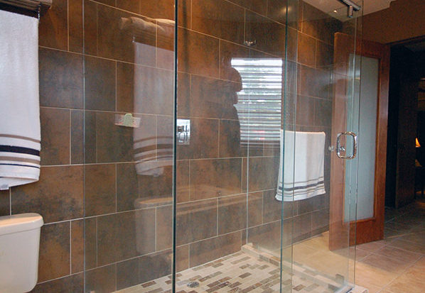 Hydroslide glass shower stall