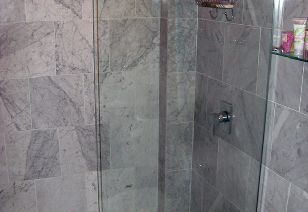 Glass wall separation for shower area